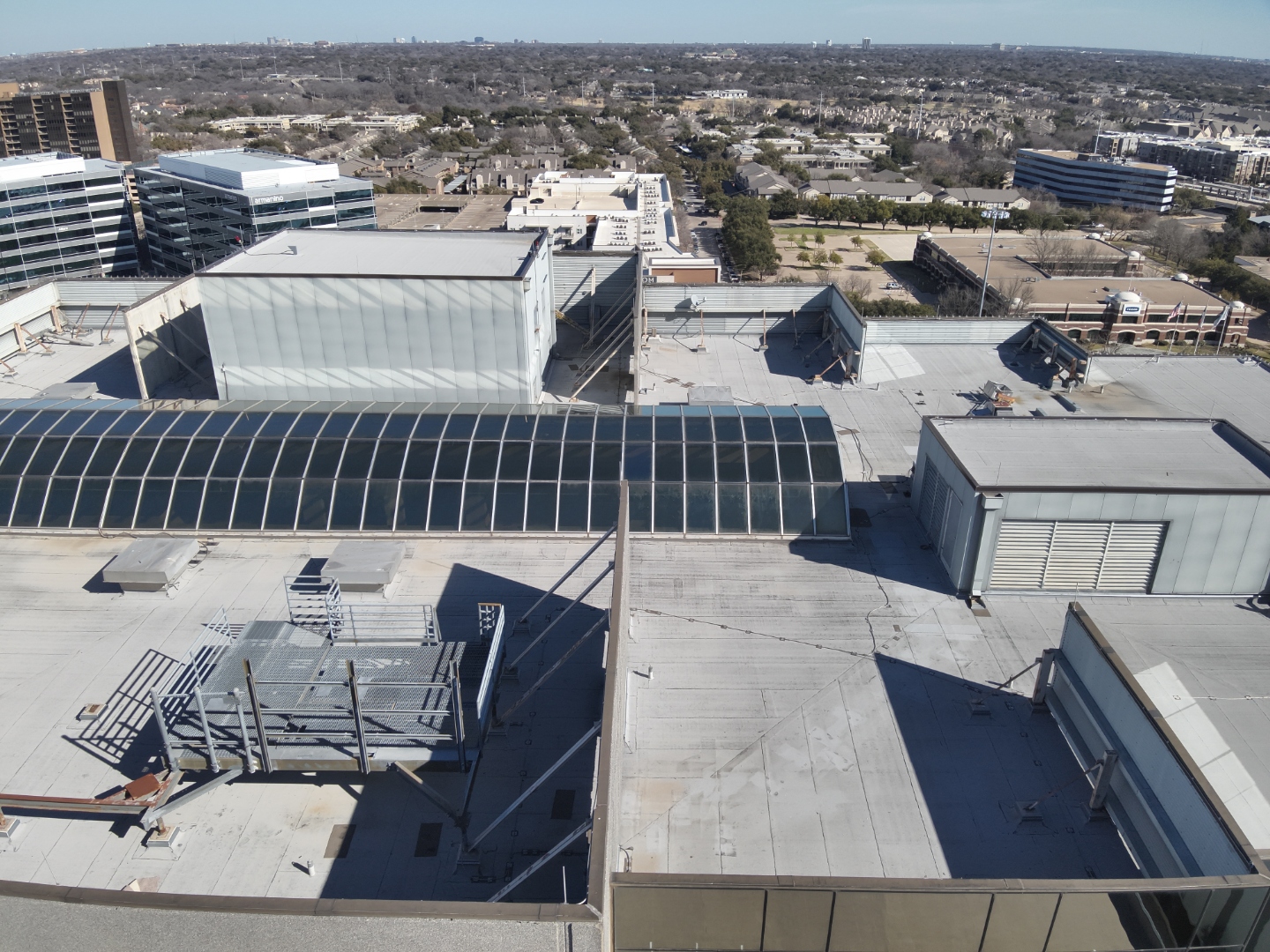 Commercial rooftop inspection — aerial nadir view of multi-building commercial complex
