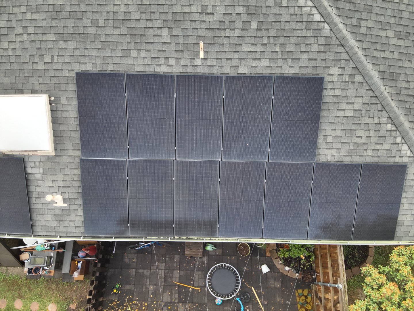 Nadir view of residential rooftop solar panel array inspection